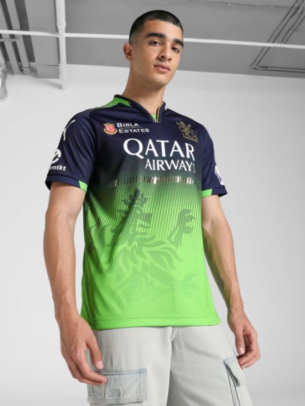 Personalized RCB green jersey with shimmering gold text for name and number.