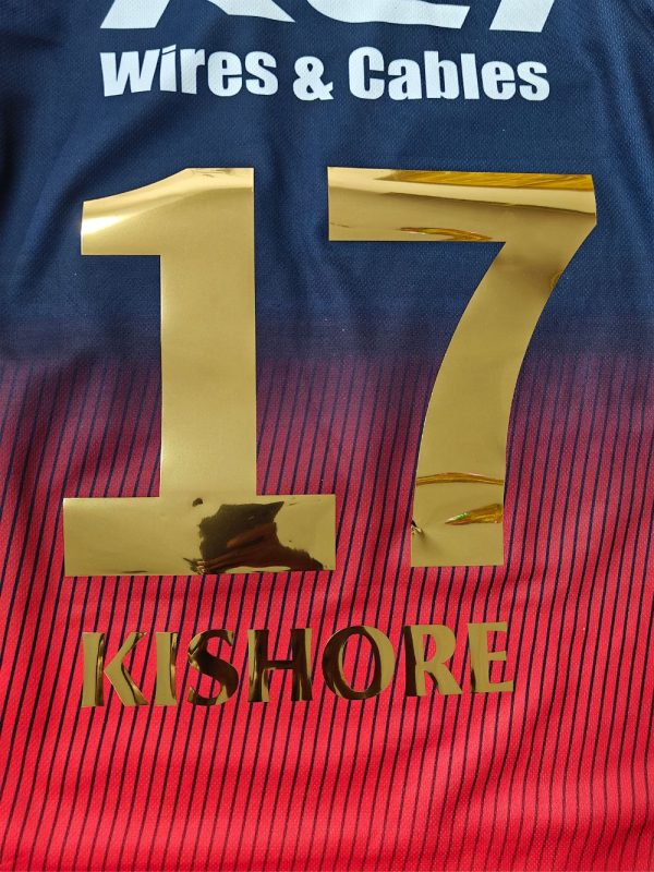 2025 RCB red jersey front with metallic gold plated