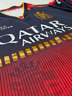 🔥 The Red Reign Begins! RCB 2025 Red Jersey with striking gold accents is here to dominate. Are you game-day ready? #RCB2025 #PlayBold #RedAndGold