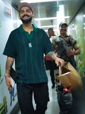 RCB green striped oversized T-shirt with golden foil logo