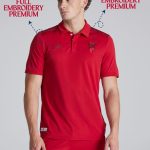 Red Manchester United polo shirt with Snapdragon sponsor