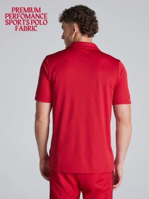 Red Manchester United polo featuring Snapdragon branding