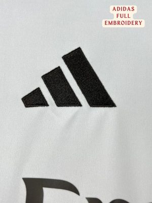 Real Madrid players in the new 25/26 kit celebrating a goal teehub